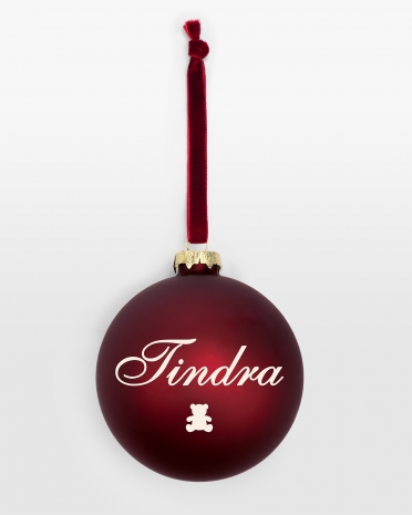 Röd julgranskula med personligt namn och symbol