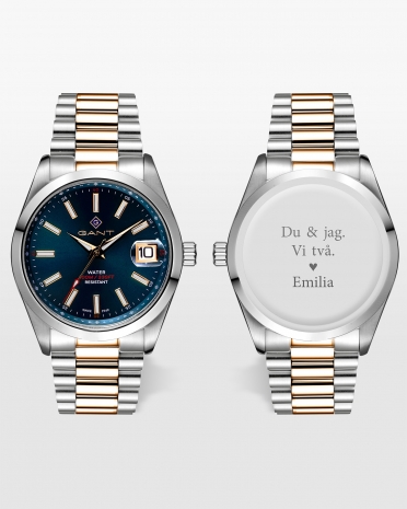 klocka med gravyr för honom