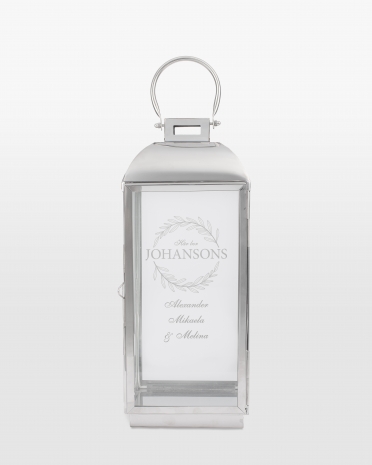 Silverfärgad ljuslykta med namn