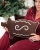 Brun pepparkakskudde i form av en gris