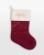 Röd julstrumpa med broderat namn