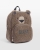 Björnryggsäck med blå brodyr med barnets namn