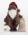 Jultomte med lykta och julklappssäck som märks med personlig julhälsning