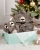 julklappstips till barn med björnmotiv av en broderad morgonrock med namn och matchande tofflor