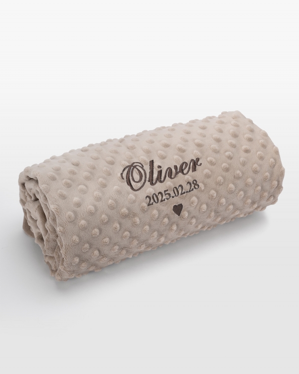 Sandfärgad babyfilt med brun namnbrodyr