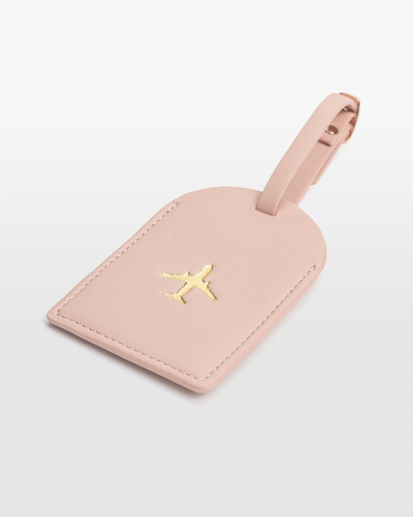 Rosa bagagetag i veganskt läder