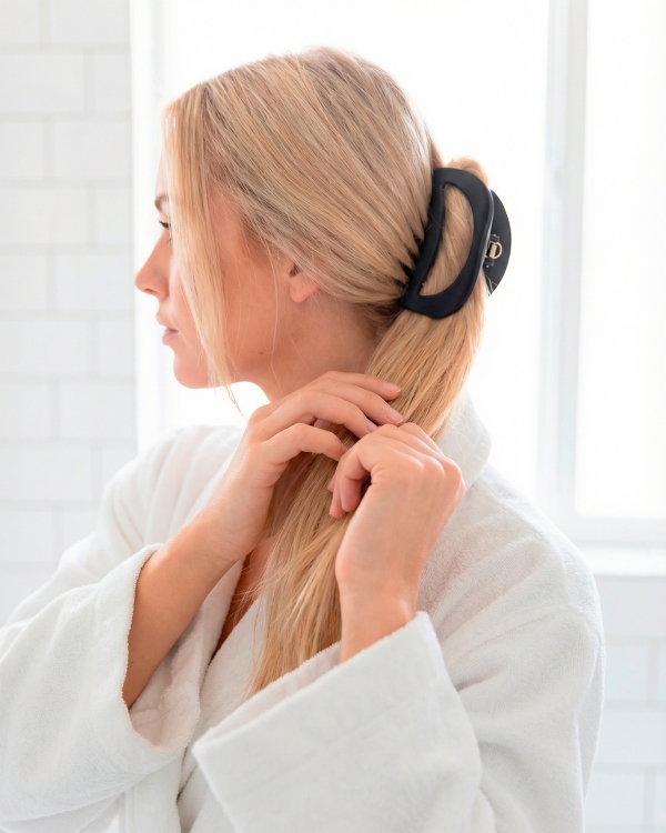 Svart kraftig hårklämma