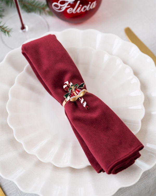 Servettring med gulddetaljer och julmotiv
