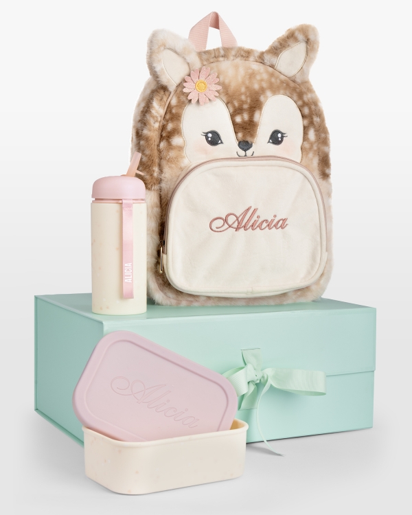 Presentset för barn innehållande en barnryggsäck i form av ett rådjur, rosa barnflaska och matlåda med namn