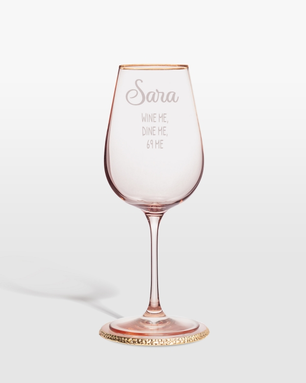 Rosa vinglas med roliga citat