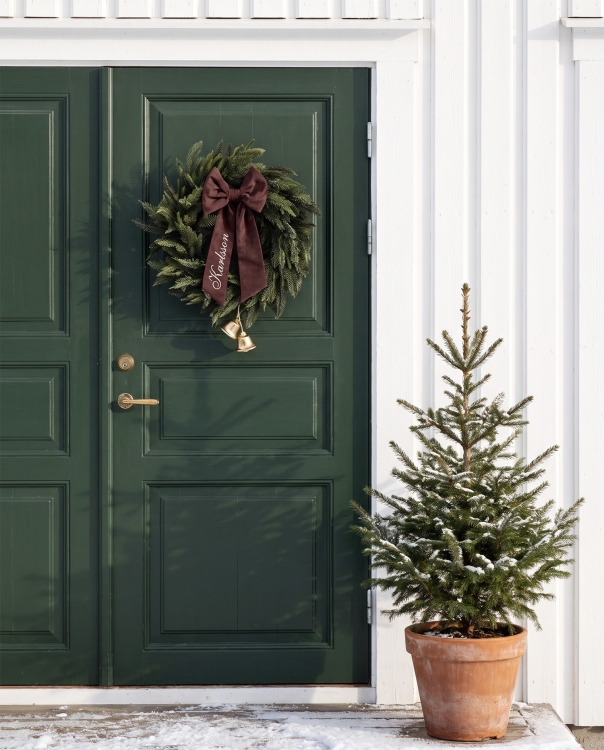 Julkrans med brun rosett med namn