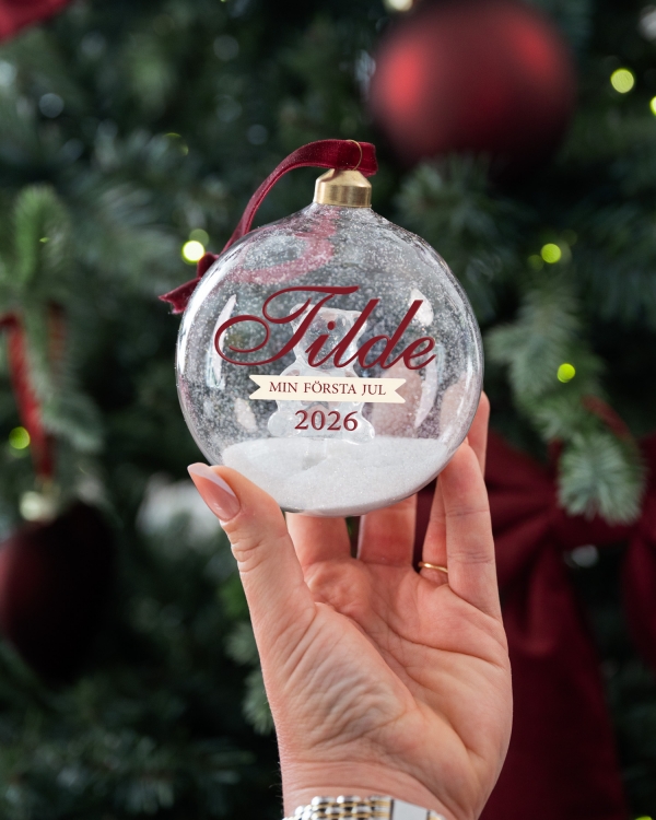 Julkula i glas med namn, personlig hälsning och motiv av en nallebjörn