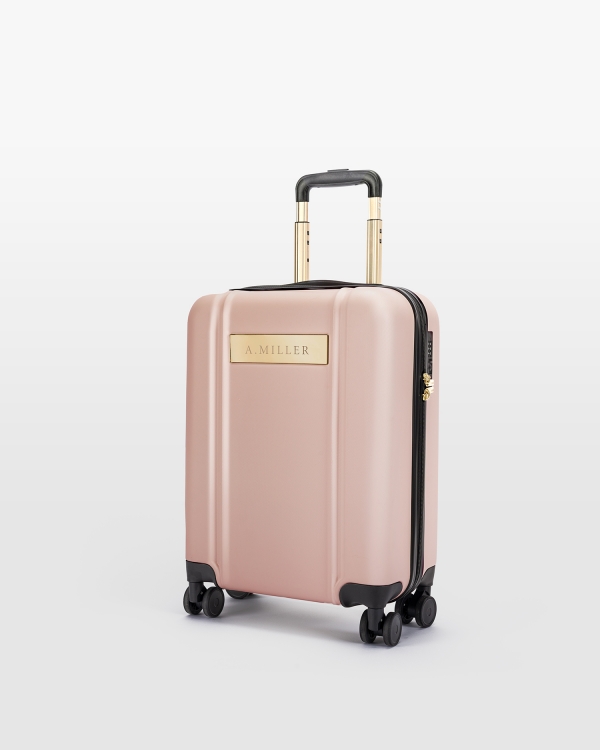 Rosa kabinväska med graverat namn och gulddetaljer