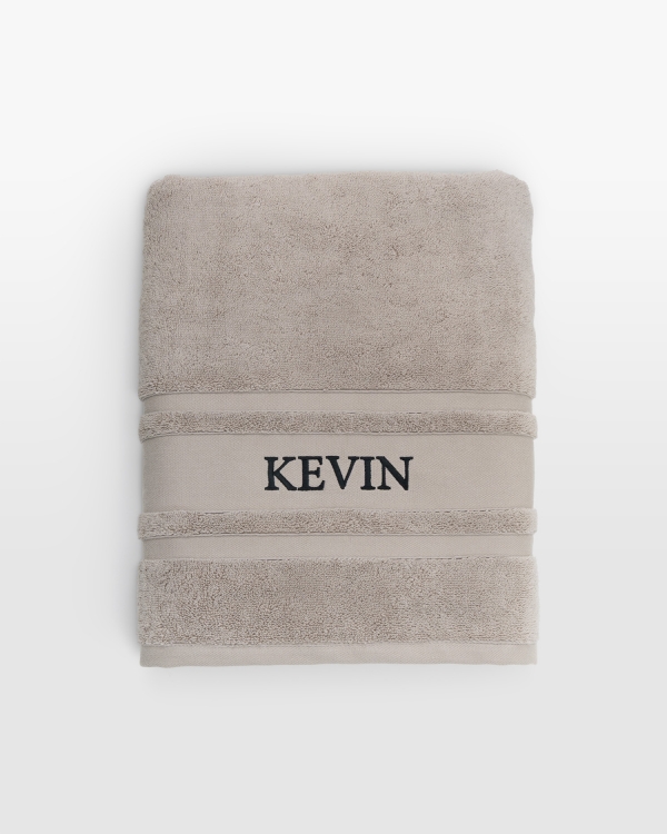 Frottéhandduk med broderat namn