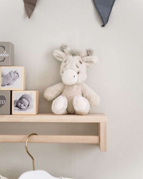 Skallra i form av en giraff