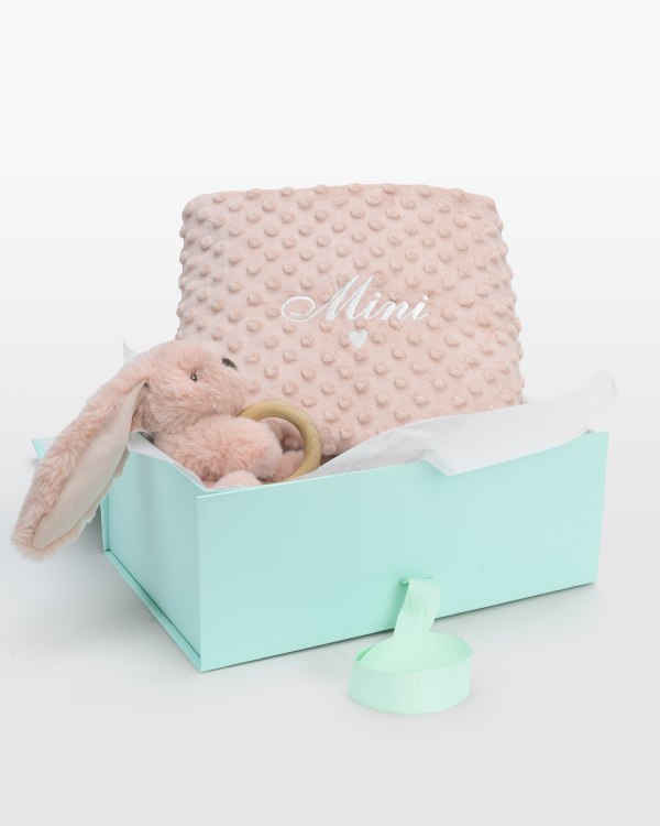 Personligt presentset med gosedjur med bitring och namnfilt