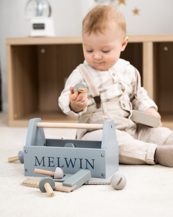 Blå verktygslåda med namn