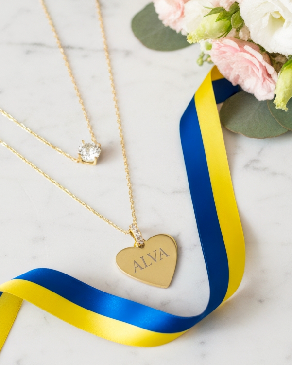 Studentpresent med graverat guldhalsband